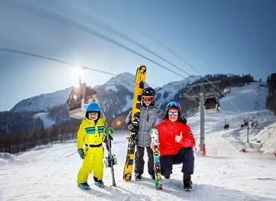 Family on vacation in the ski resort of Sochi