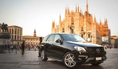Private transfer at Malpensa airport. Car in the square