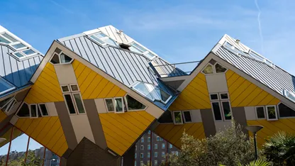 Travel to see Rotterdam's tilted Cube Houses by architect Piet Blom